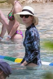 Charlize Theron in Swimsuit at Atlantis Bahamas Resort 08/18/2018