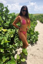 Claudia Romani in a red Bikini at Delray Beach