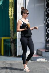 Dakota Johnson in Tights - Picking Up an Iced Coffee in LA 08/20/2018