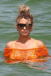 Emily Sears in an Off-The-Shoulder Crochet Dress and Bikini on the Beach in Miami 08/09/2018