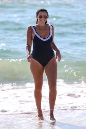 Imogen Thomas in a Blue Swimsuit on the Beach in Miami 08/26/2018