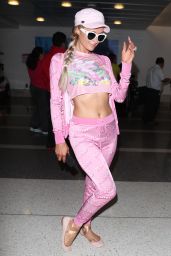 Paris Hilton in a Pink Moschino Outfit at LAX 08/02/2018