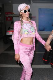 Paris Hilton in a Pink Moschino Outfit at LAX 08/02/2018