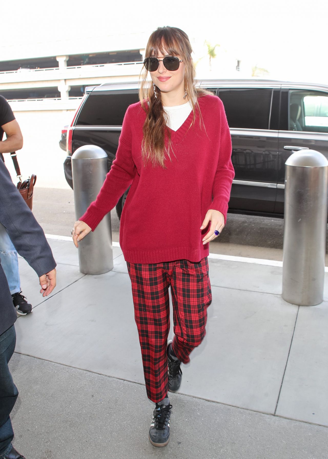 Dakota Johnson at LAX Airport in Los Angeles 09/26/2018  CelebMafia