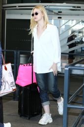 Elle Fanning - Arriving at CDG Airport in Paris 09/29/2018