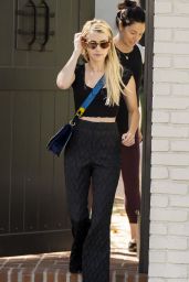 Emma Roberts Looks Stylish in a Black Cropped Top and Bell Bottoms - West Hollywood 09/27/2018