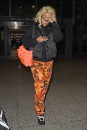 Rita Ora in Camo Pants at Heathrow Airport 09/19/2018