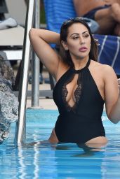 Sophie Kasaei in a Black Swimsuit on Holiday in Tenerife 09/30/2018