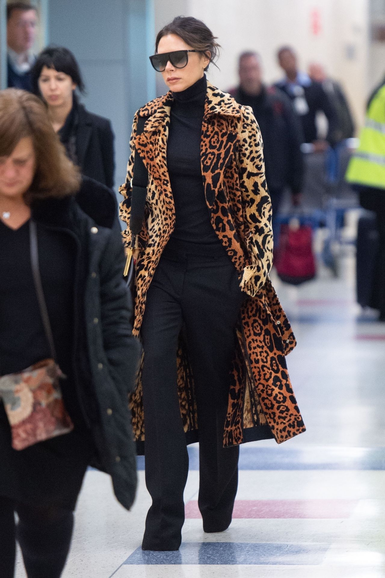 Victoria Beckham in a Faux Leopard Coat - JFK Airport in NY 11/26/2018 ...