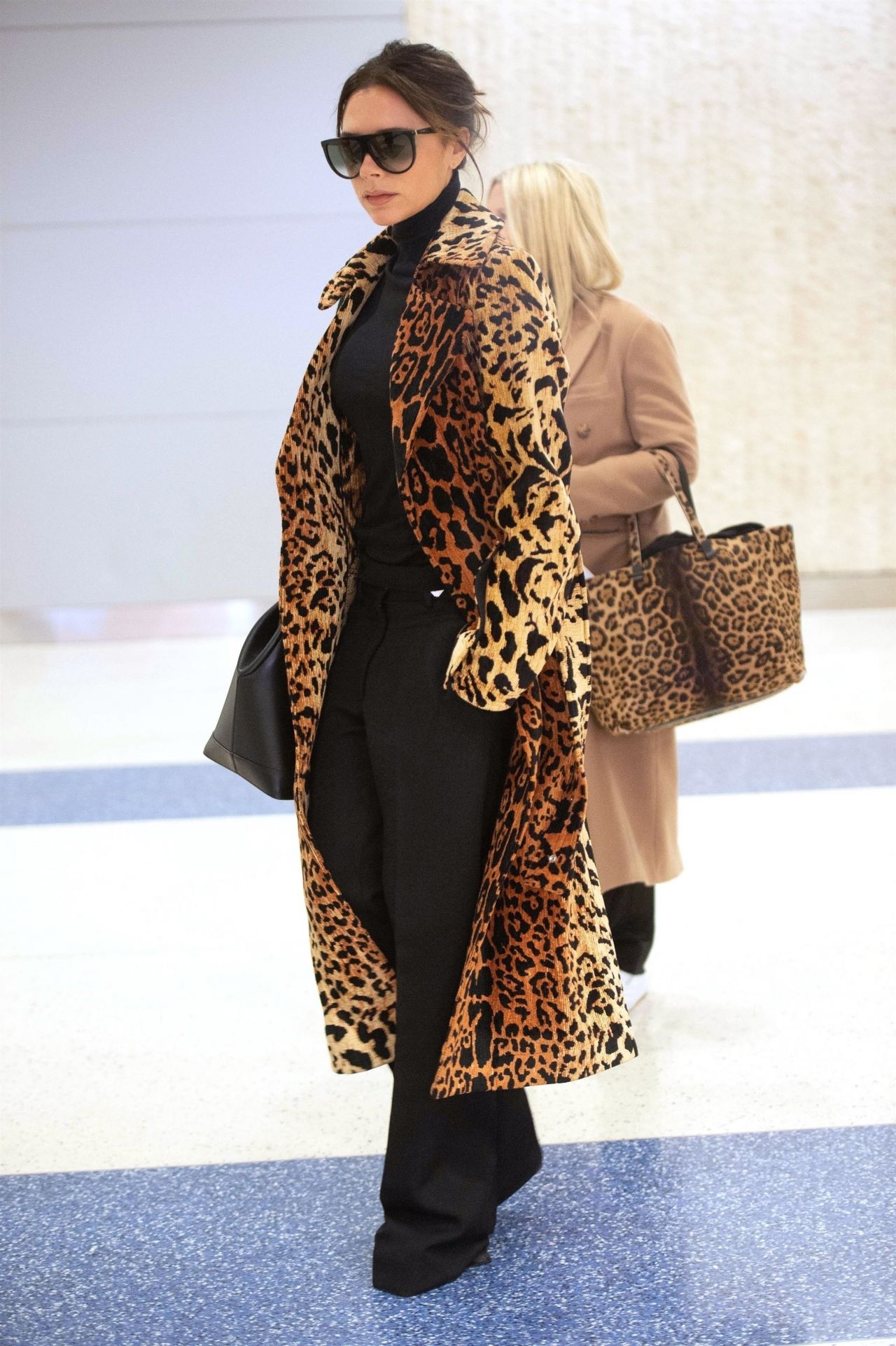 Victoria Beckham in a Faux Leopard Coat - JFK Airport in NY 11/26/2018 ...