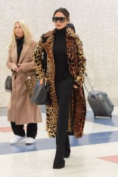 Victoria Beckham in a Faux Leopard Coat - JFK Airport in NY 11/26/2018