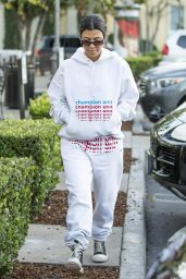 Kourtney Kardashian in Grey Sweatsuit Hoodie, Black High-Top Sneakers and Dark Sunglasses 12/02/2018