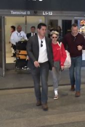 Kristen Stewart in a Bright Red Champion Sweater and Jeans 12/13/2018