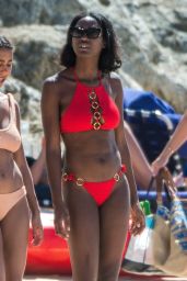Mouna Traore in a Bright Red Bikini 12/25/2018