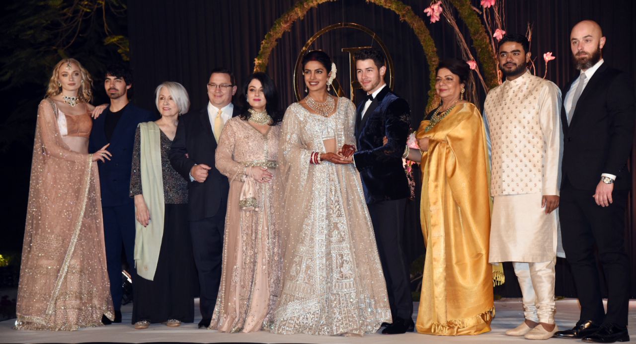 https://celebmafia.com/wp-content/uploads/2018/12/sophie-turner-and-joe-jonas-at-wedding-reception-in-india-12-04-2018-0.jpg
