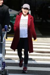 Constance Wu in a Red Coat - LAX in Los Angeles 01/09/2019