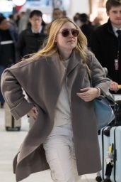 Dakota Fanning in Travel Outfit - Charles-de-Gaulle Airport in Paris 01/21/2019
