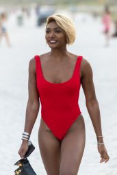 Elisa Johnson in a Red Swimsuit in Miami Beach 01/01/2019