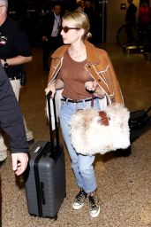 Emma Roberts in Travel Outfit 01/25/2019
