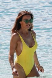Lizzie Cundy in a Yellow Swimsuit on the Beach in Barbados 01/03/2019