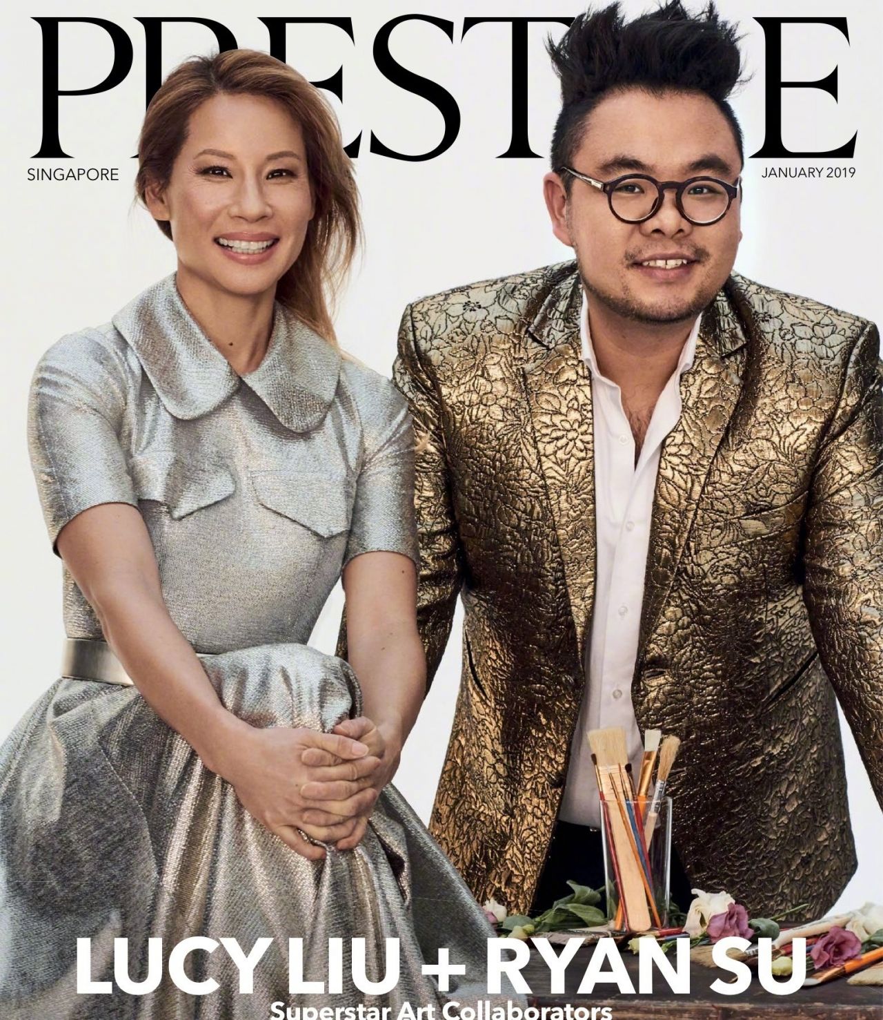 https://celebmafia.com/wp-content/uploads/2019/01/lucy-liu-and-ryan-su-prestige-singapore-january-2019-3.jpg