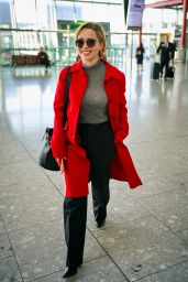 Emilia Clarke in Travel Outfit - Heathrow Airport in London 02/21/2019
