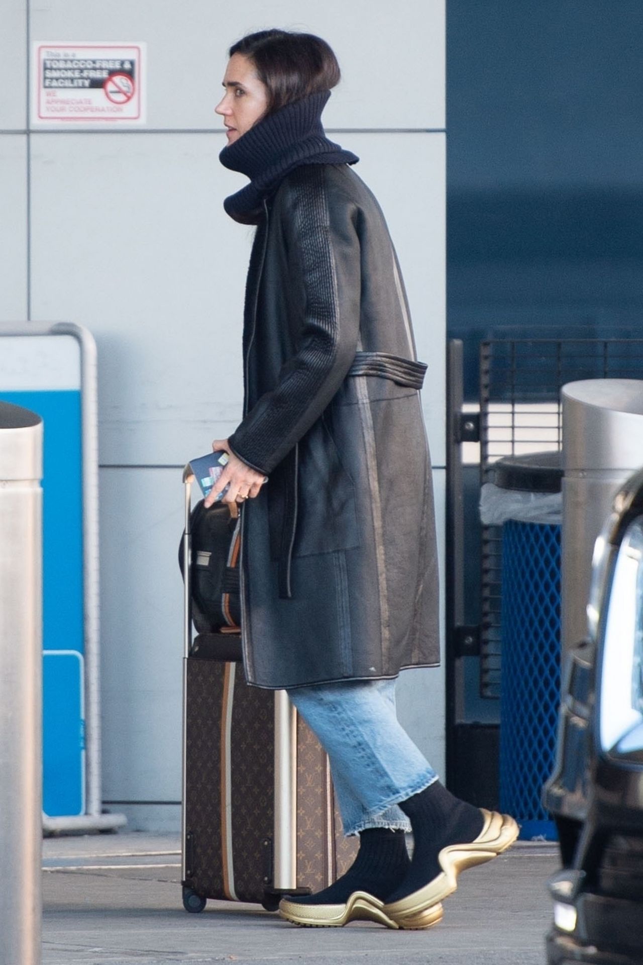Jennifer Connelly arriving at JFK airport with her children New