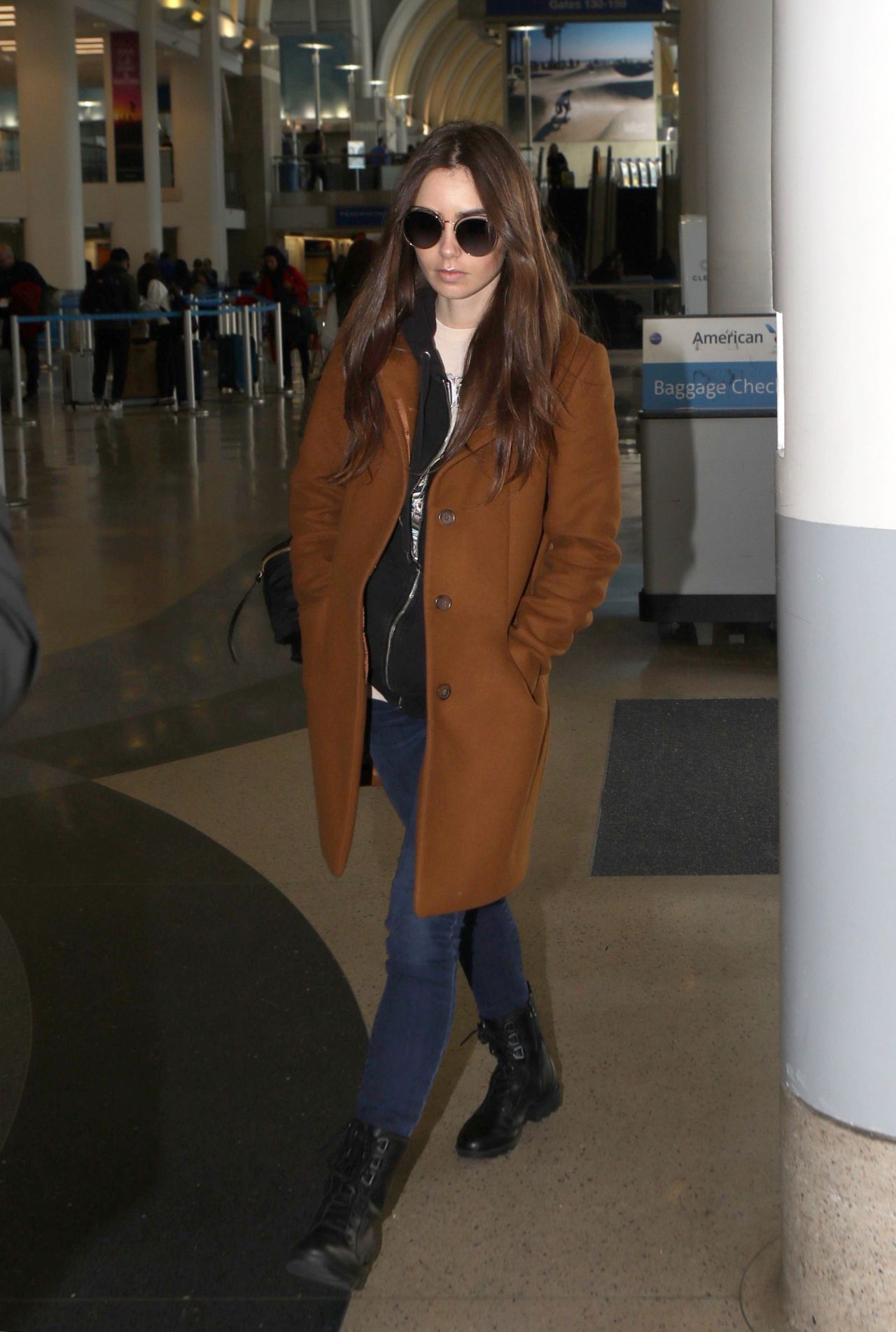 Lily Collins in Travel Outfit - LAX Airport 02/27/2019 • CelebMafia