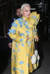 Rita Ora in a Yellow and Blue Dress and Pink Stockings 02/13/2019