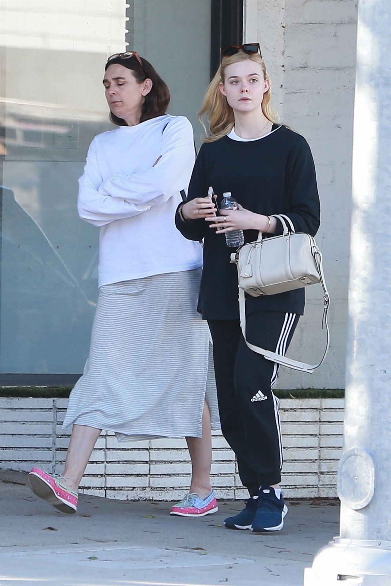 Elle Fanning - Out With Her Mom in LA 03/07/2019 • CelebMafia