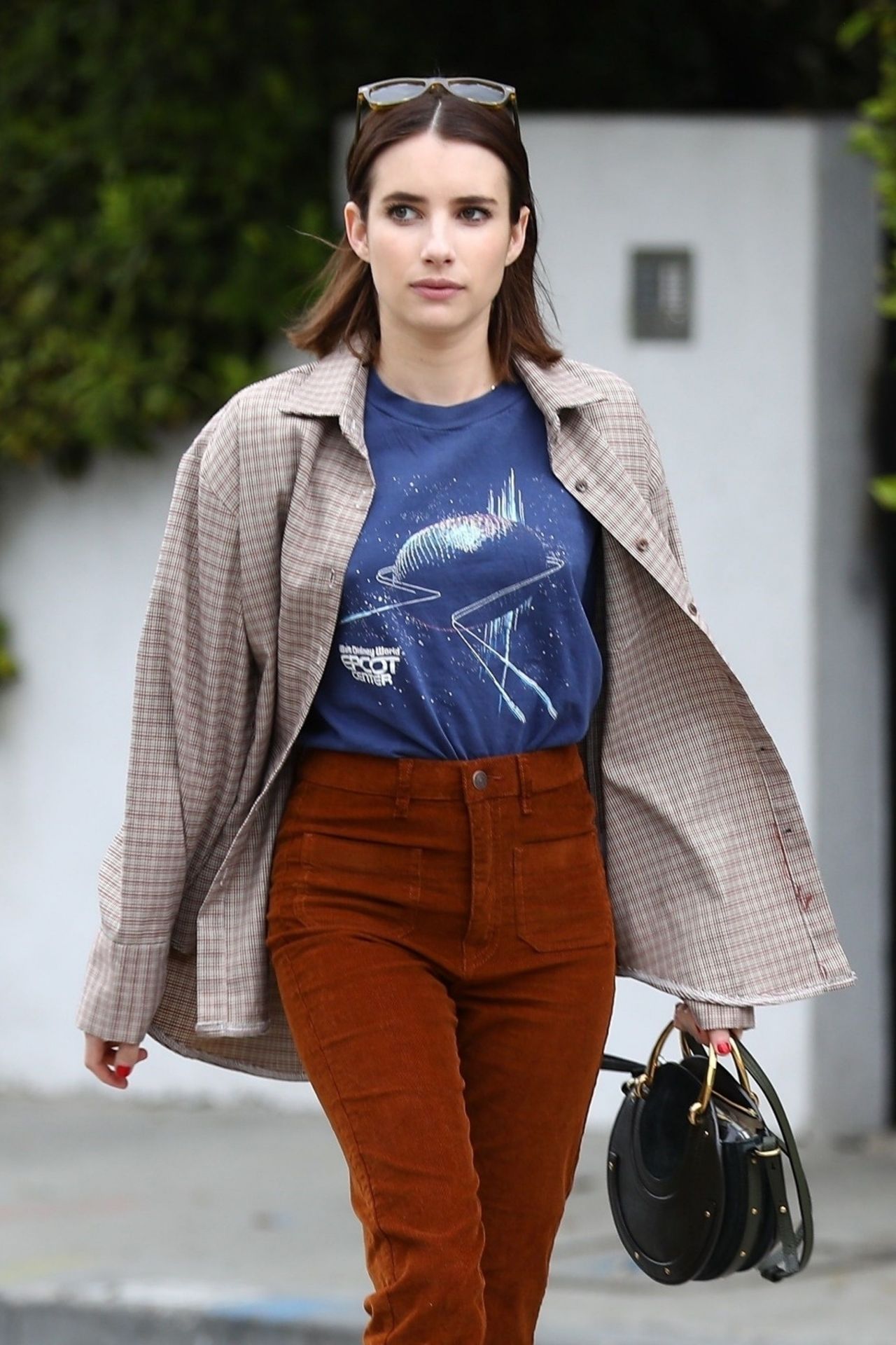 Emma Roberts with brown leather bucket bag in LA on March 27 ~ I