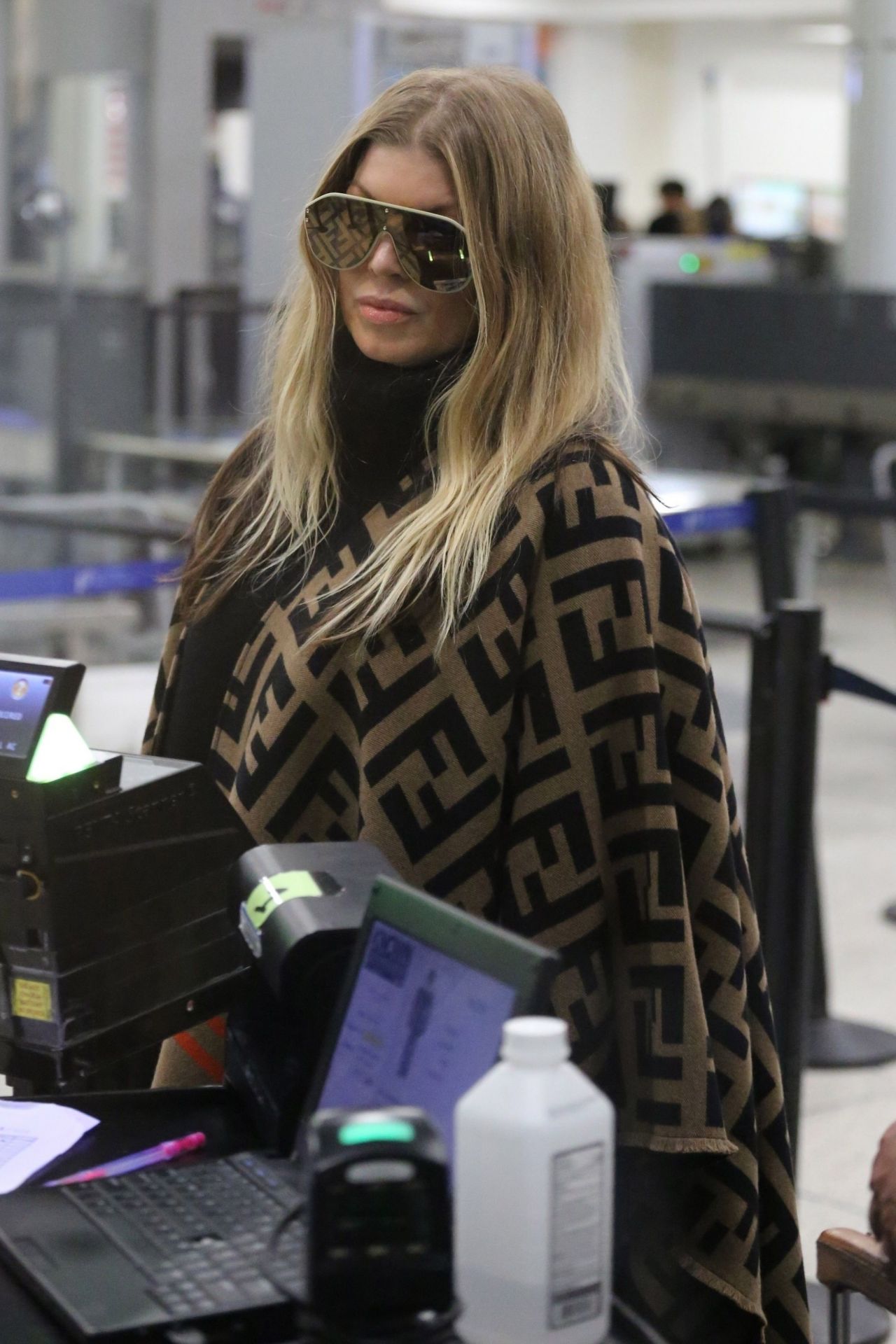 Fergie in a Fendi Poncho - LAX Airport in LA 03/19/2019 • CelebMafia