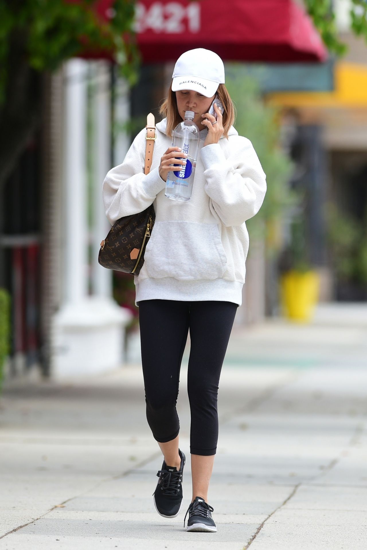 Ashley Tisdale wearing Free City Sweat Pants, Louis Vuitton