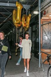 Bella Hadid - Holding GIGI Balloons While Celebrating Her Sister Gigi