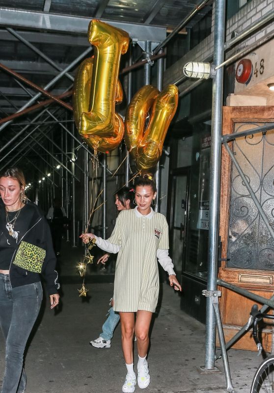 Bella Hadid - Holding GIGI Balloons While Celebrating Her Sister Gigi