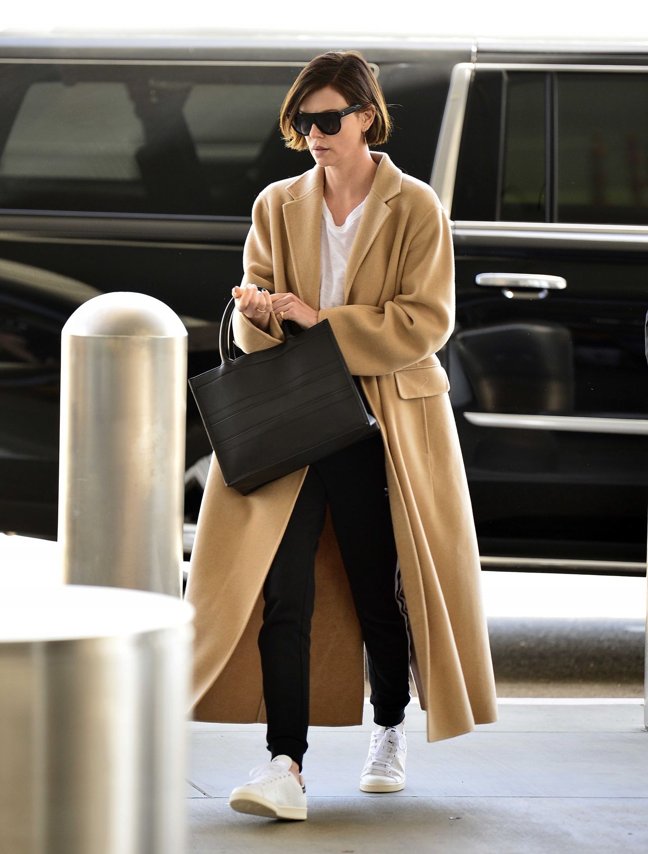 Charlize Theron at LAX August 12, 2016 – Star Style