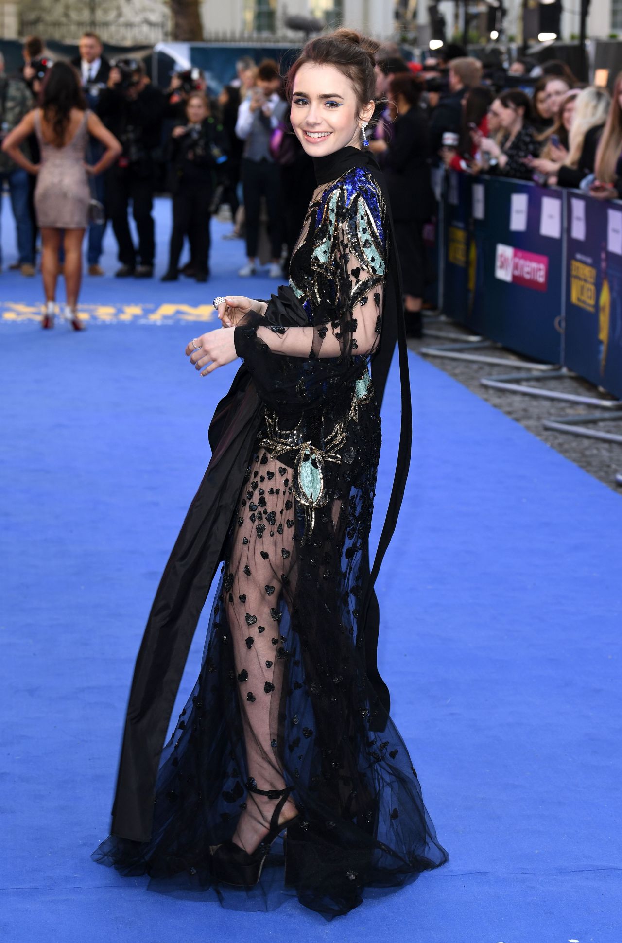 https://celebmafia.com/wp-content/uploads/2019/04/lily-collins-extremely-wicked-shockingly-evil-and-vile-premiere-in-london-8.jpg