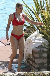 Michelle Hunziker in Bikini on Lake Garda in Gargnano 03/31/2019