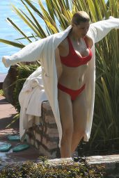 Michelle Hunziker in Bikini on Lake Garda in Gargnano 03/31/2019