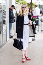 Elle Fanning Shows Off Her Eclectic Style - Martinez Hotel in Cannes 05/20/2019
