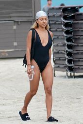 Karrueche Tran in a Black Swimsuit at the Beach in Miami Beach 05/13/2019