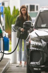 Lily Collins Pumps Gas in Los Angeles 05/09/19