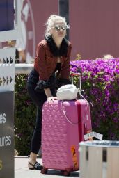 Pixie Lott in a Patterned Mini Jacket and Moschino Flip Flops at Airport in Ibiza 05/30/2019