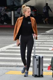 Toni Garrn and Alex Pettyfer at LAX Airport 04/29/2019