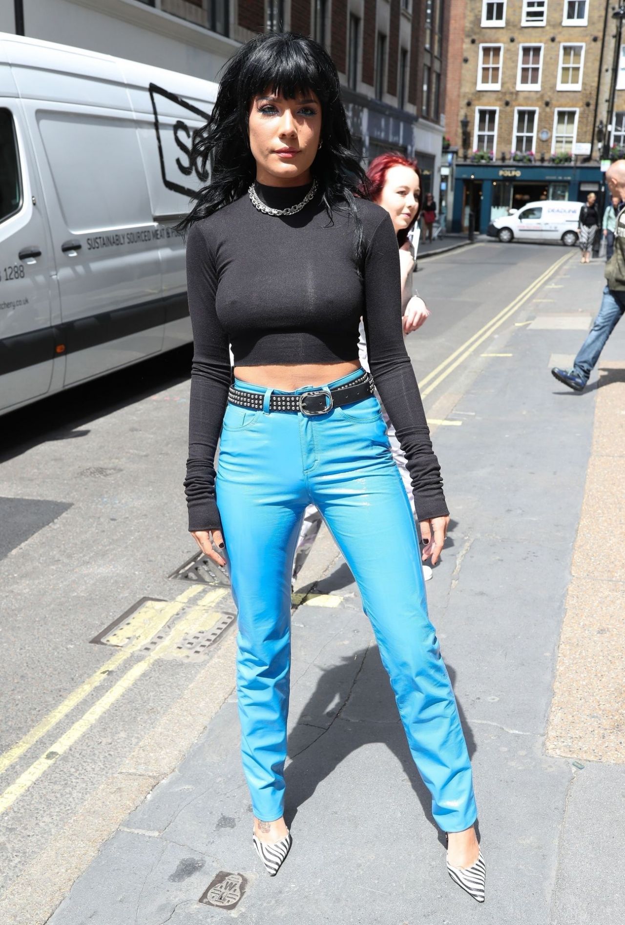 in a Skin-Tight Top and Blue Trousers CelebMafia