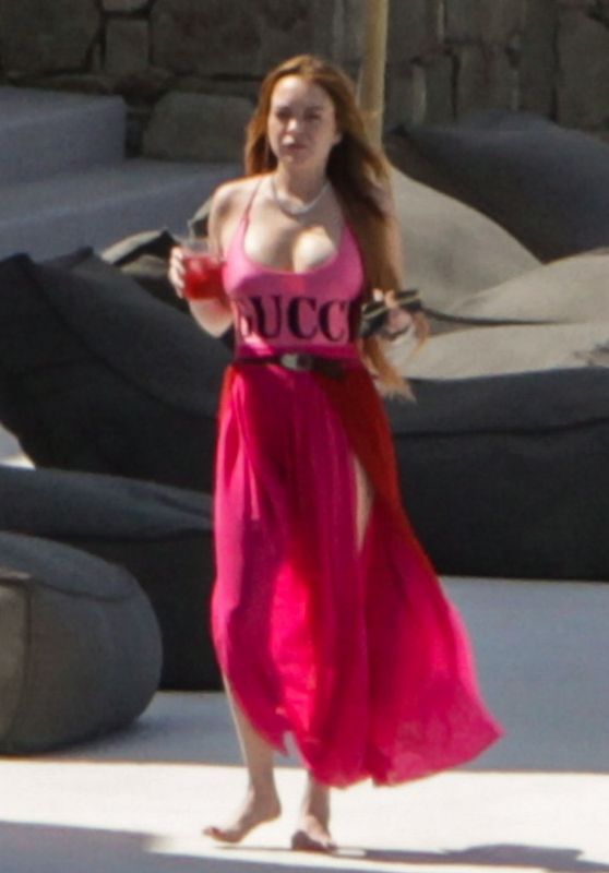 Lindsay Lohan in a Pink GUCCI Swimsuit on Mykonos Island 06/22/2019