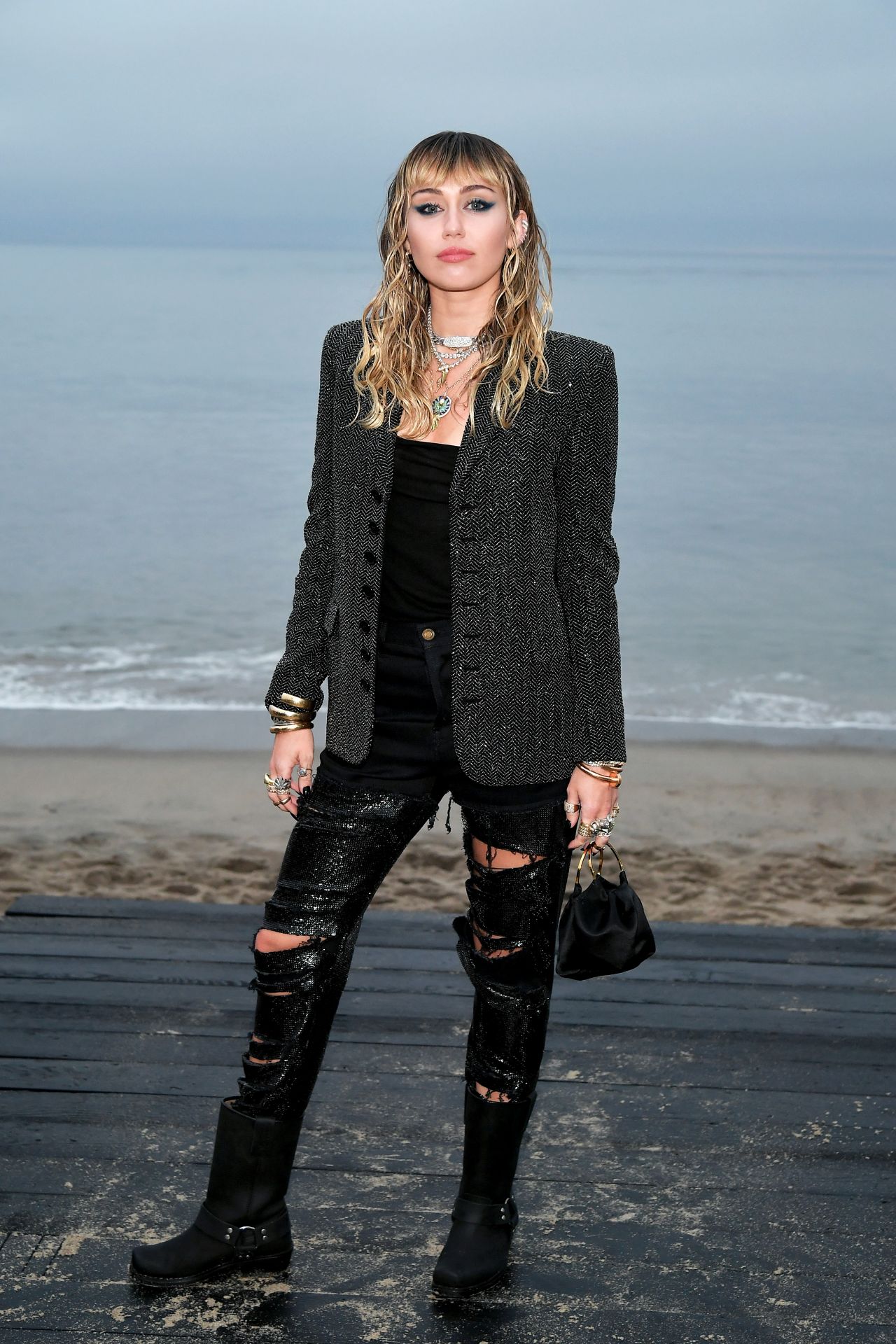 https://celebmafia.com/wp-content/uploads/2019/06/miley-cyrus-saint-laurent-mens-s-s-20-show-photocall-in-malibu-06-06-2019-13.jpg