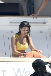 Kourtney Kardashian in a Yellow Bikini on a Yacht in Corsica 07/26/2019