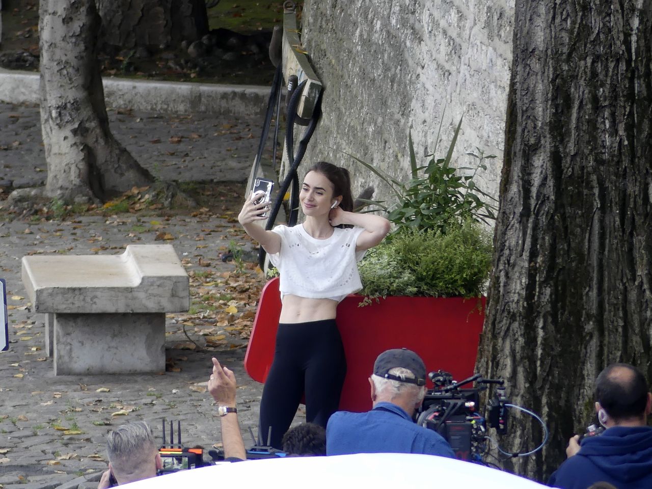 Lily Collins - Filming "Emily in Paris" 08/19/2019 • CelebMafia