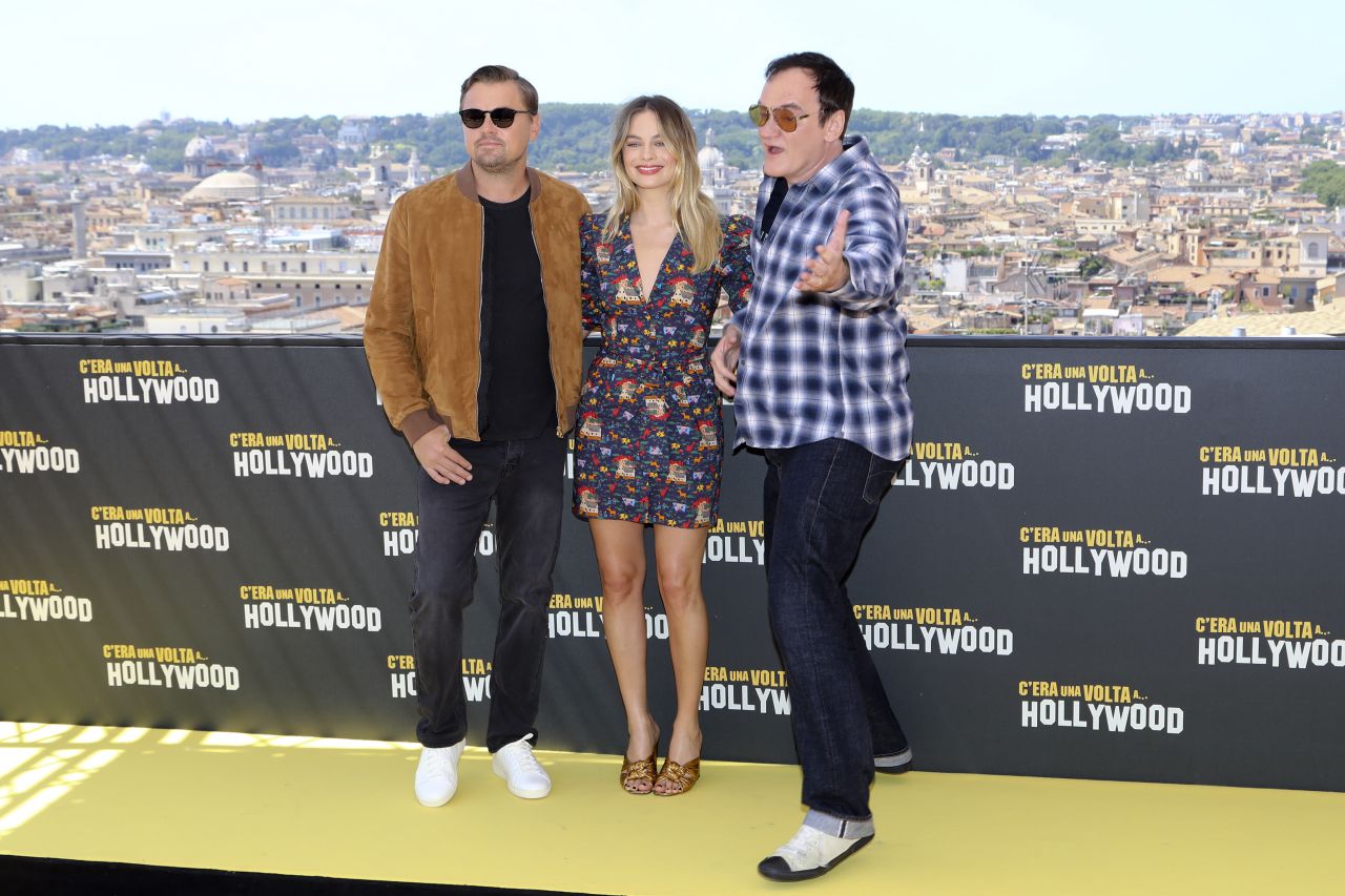 https://celebmafia.com/wp-content/uploads/2019/08/margot-robbie-once-upon-a-time-in-hollywood-photocall-in-rome-1.jpg